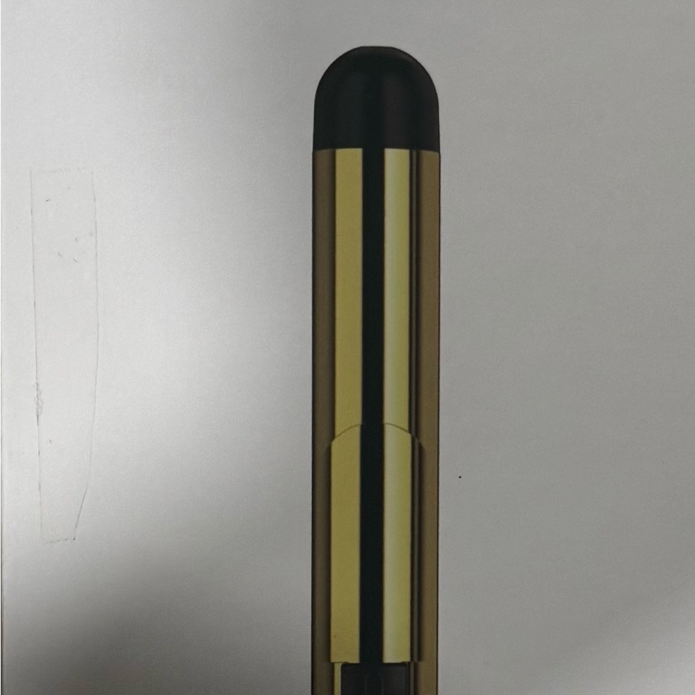 Gold and Black Hair Styling Tool